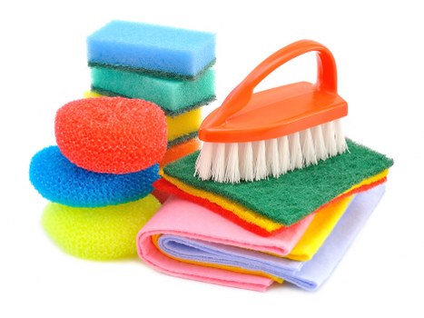 Cleaner restoring a stained sofa with expert cleaning methods