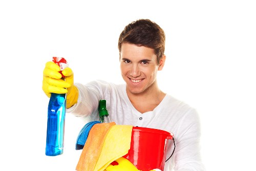 Specialist after builders cleaning in Clapham tidying a freshly renovated property interior
